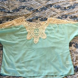 Baby blue blouse with knitted design